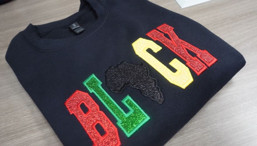 applique embroidery on a tee by Gears Sphere
